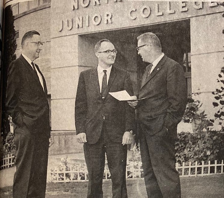 Barry Schuler, center, is welcomed to North Idaho College by President P.A. Christianson, left, and board chairman E.A. Seiter.