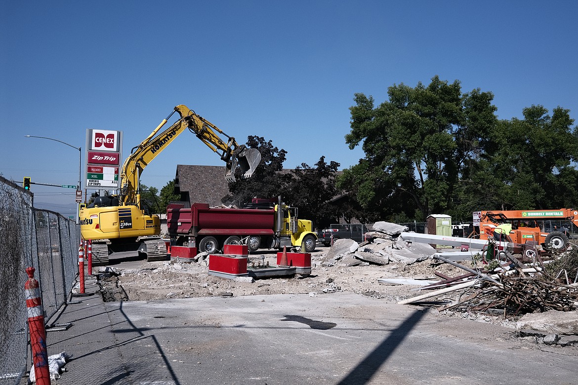 Construction crews demolish the old Cenex Zip Trip gas station and convenience store in Kalispell on August 15, 2023. The new gas station is expected to open in 2024. (Adrian Knowler/Daily Inter Lake)