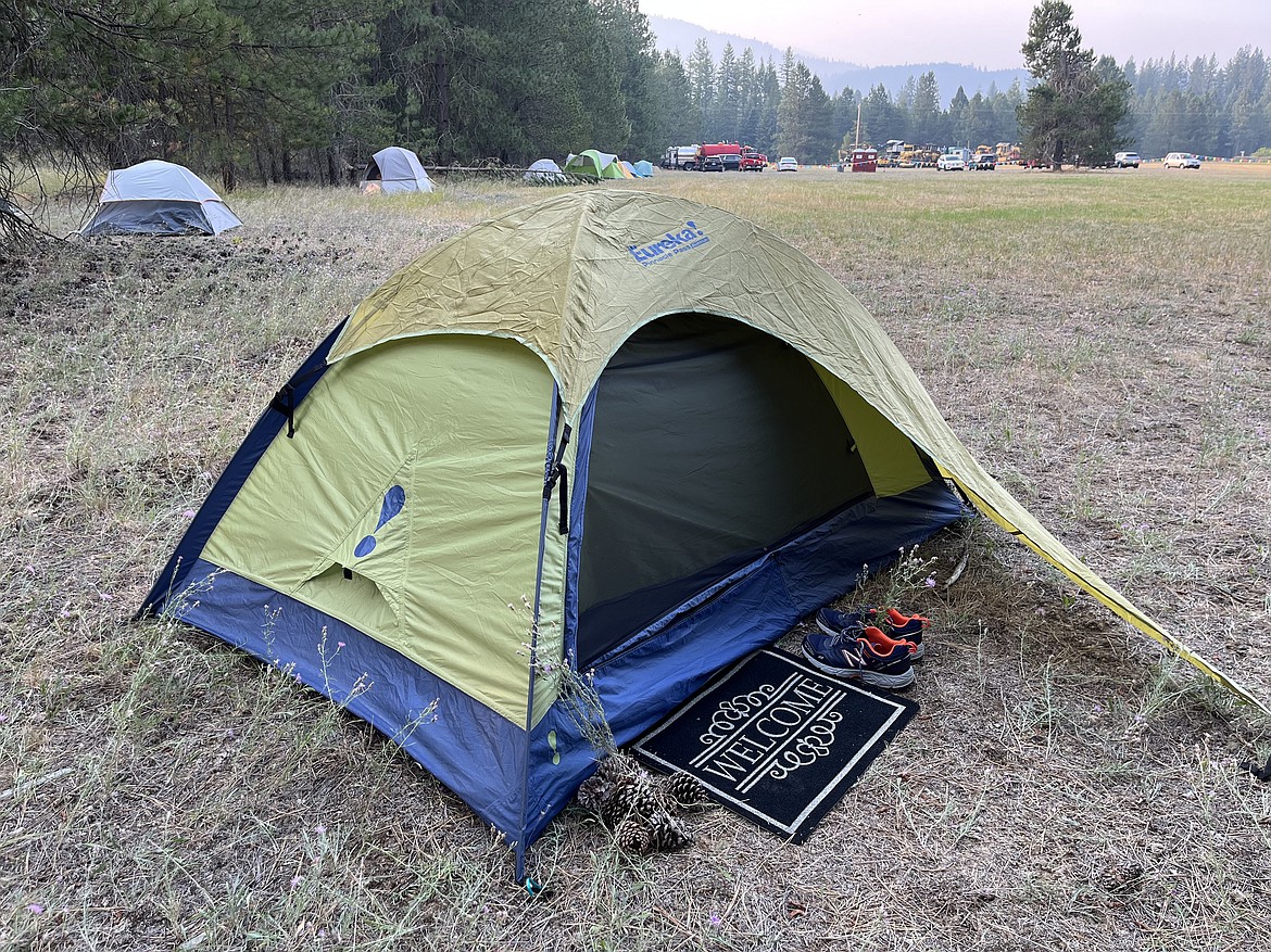 A tent pitched at fire camp, a site for firefighters and command staff at behind the front line of the Ridge Creek Fire.