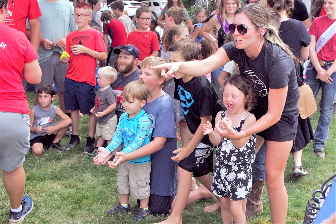 Kids participate in the balloon toss at the Boundary County Fair.