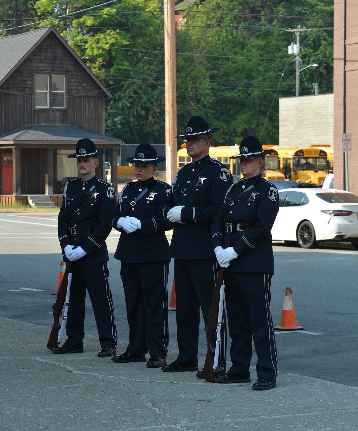 Members of the Idaho State Police color guard prepare to march during the dedication of a memorial to two fallen police officers in Shoshone County Thursday morning outside the Shoshone County Courthouse.