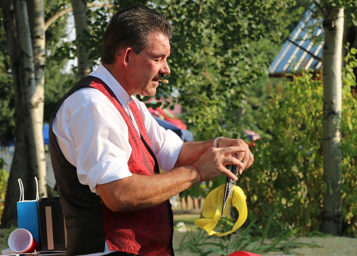 Cecil the Magician performs to an enthralled audience as the Bonner County Fair kicked off on Wednesday.