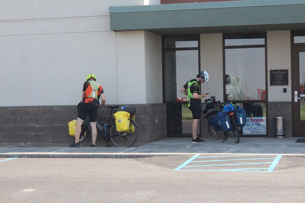 Eric Andersson, left, and Axel Andersson, right, made a stop in Othello as part of their bike ride across the country.