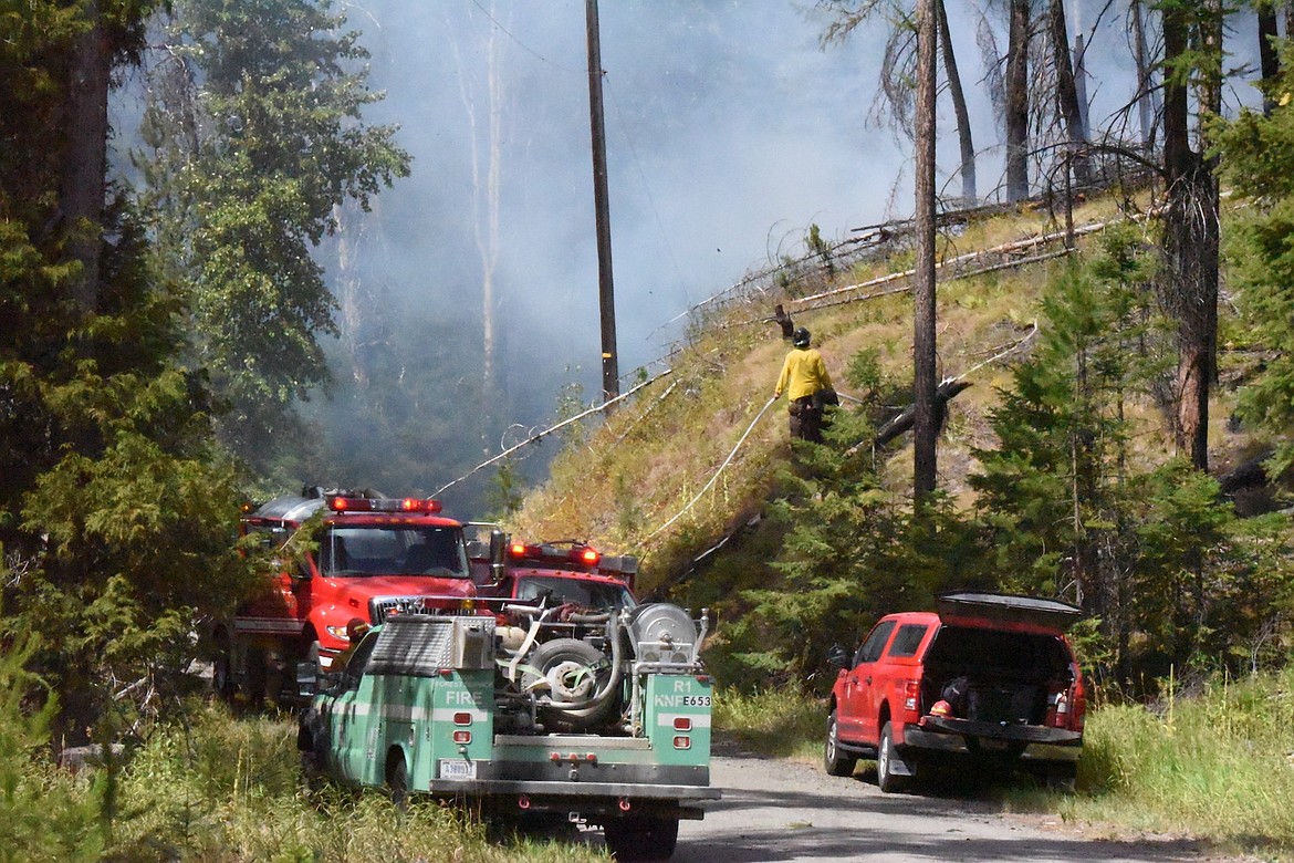 Smoke pours off the Powerline Fire on Bobtail Road north of Libby Friday afternoon. (Scott Shindledecker/The Western News)