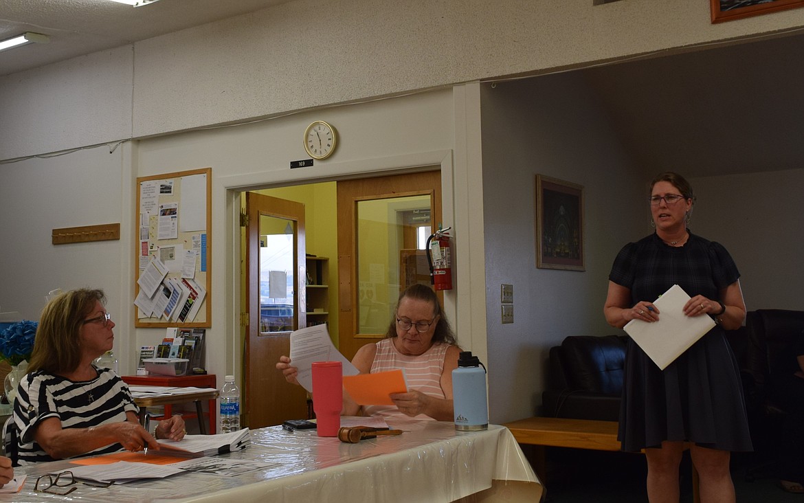 Members of the Soap Lake City Council listen to Grant County Health District Environmental Health Manager Stephanie Shopbell outline the options for bringing into compliance a  piece of city-owned property with solid waste on the site without a permit.