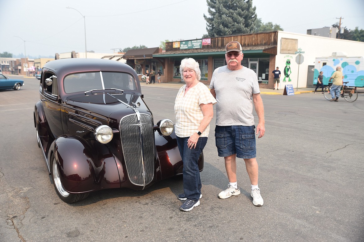 Spokane Valley, Washington's John and June Sine show off the People's Choice winner, a 1936 Chevy Tudor sedan, at the 2023 Ignite the Nites Car Show. (Scott Shindledecker/The Western News)