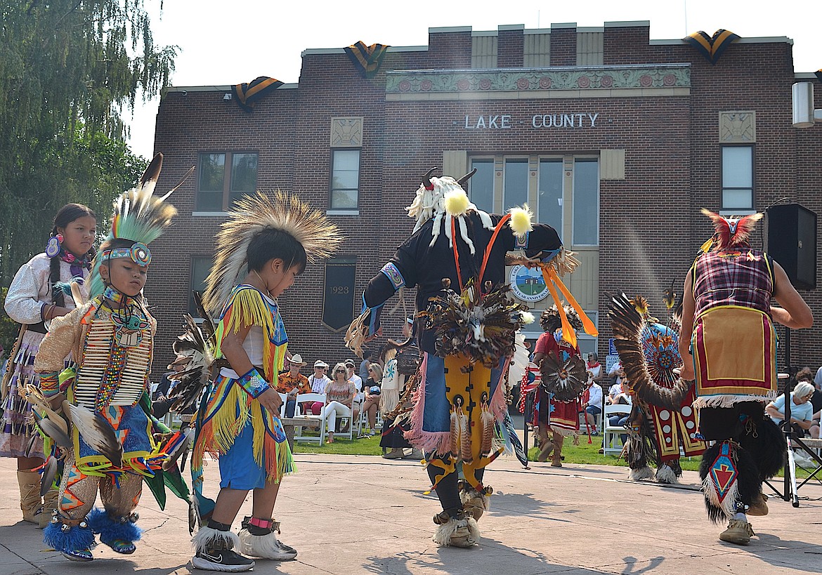 Members of the Flathead Reservation Traditional Dance Troupe and the Buckshot Singers performed in front of the Lake County Courthouse Saturday. (Kristi Niemeyer/Leader)