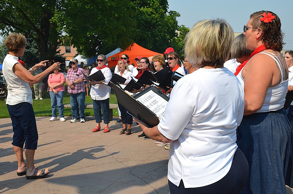 The Mission Valley Choral Society, under the direction of Cathy Gillhouse, delivered the National Anthem and Montana's State Song in front of the courthouse Saturday. (Kristi Niemeyer/Leader)