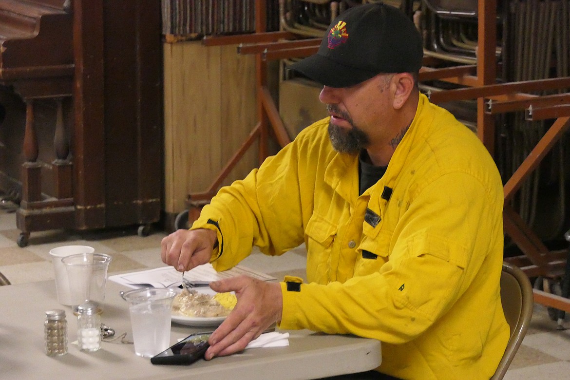 Phoenix-area firefighter Eric Brink was among the more than 100 firefighters, many from outside the area, who attended the free biscuits and gravy breakfast Sunday as a "thank you" for their efforts at fighting the Paradise fire.  (Chuck Bandel/VP-MI)