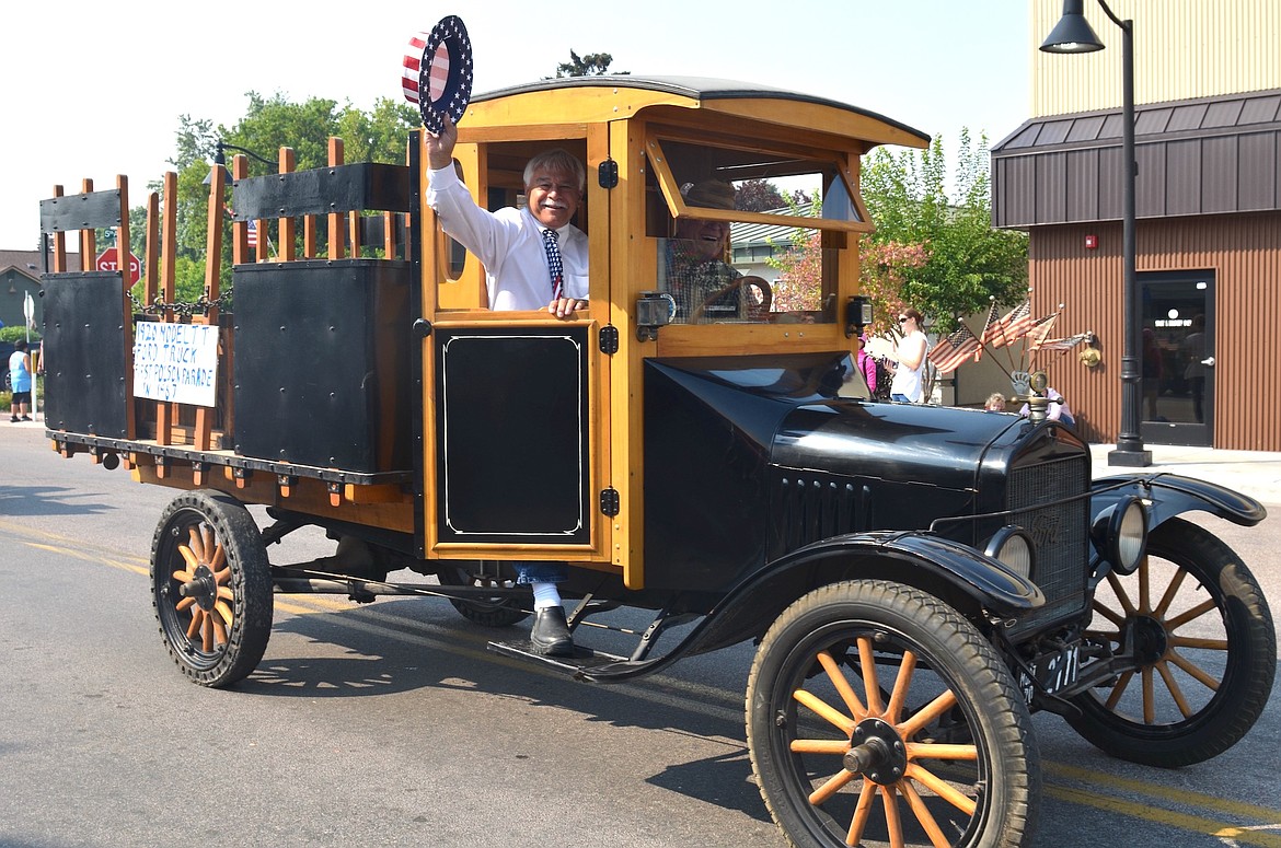 Lake County Commissioner Bill Barron was ferried through town in a 1920 Model TT truck during Saturday's Centennial Parade. (Kristi Niemeyer/Leader)