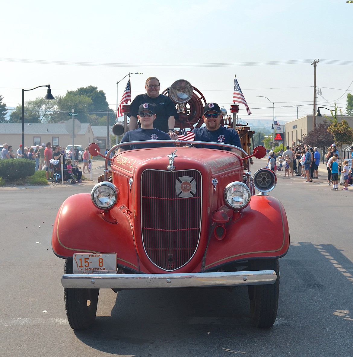 A retro Polson fire truck made its way down Main Street Saturday during Lake County's Centennial Parade. (Kristi Niemeyer/Leader)