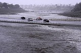 Rain from Tropical Storm Hilary lashes California and Mexico, swamping roads and trapping cars