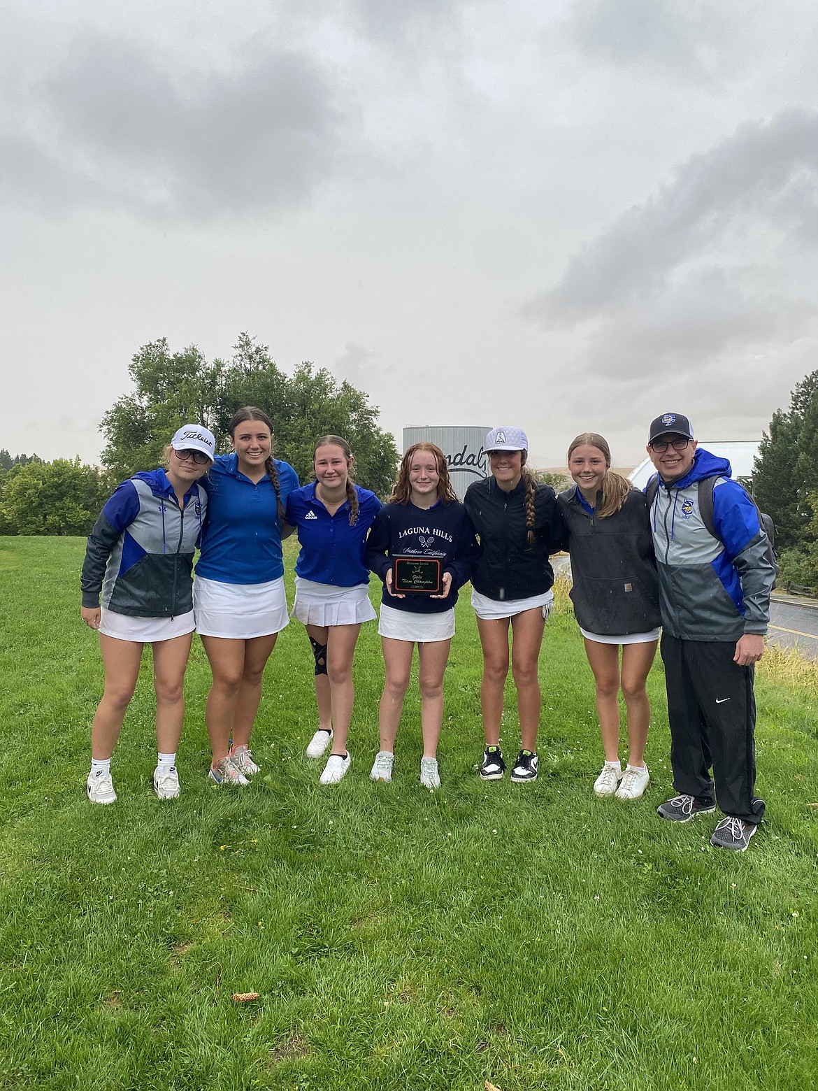 Courtesy photo
Coeur d'Alene's girls won the Moscow Invitational on Monday at the University of Idaho Golf Course in Moscow. From left are Chloe Orear, Aniston Ewing, Addie Garcia, Mady Riley, Sophia Vignale, Stella Deitz and coach Jeff Lake.