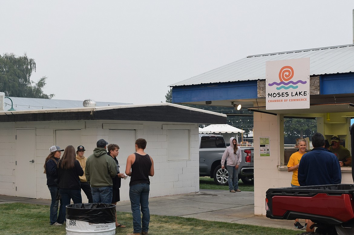 Members of 4-H, Future Farmers of America, Washington State Grange and other youth involved in the fair eat breakfast provided by the Moses Lake Chamber of Commerce Sunday morning.