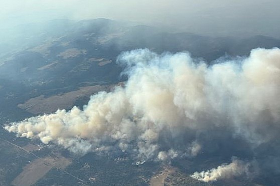 An aerial view of the Oregon Road fire north of Spokane Friday. The fire, which was estimated at 100 acres Friday afternoon, had ballooned to more than 10,000 acres by Monday afternoon.