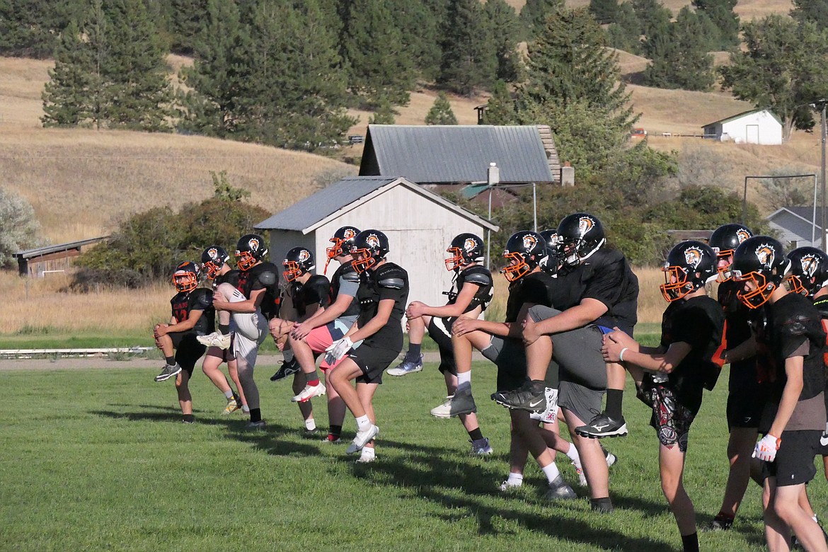 Members of this year's Plains High football team go through stretching exercises prior to a practice this past Friday in Plains.  The Horsemen open the season this Friday when they host the Mission Bulldogs at 7 p.m. (Chuck Bandel/VP-MI)