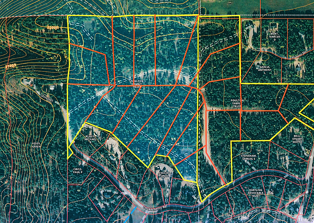 The proposed Poulton Pines subdivision is marked within the yellow lines. The red lines indicated the proposed 19 lots totaling over 62 acres. The proposed subdivision is adjacent to 822 Chokecherry Drive and north of Bonners Ferry.