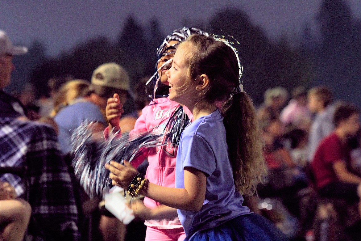 Young girls do some cheering of their own echoing the Badger Cheerleaders at the 3rd Annual Blue and White Scrimmage.