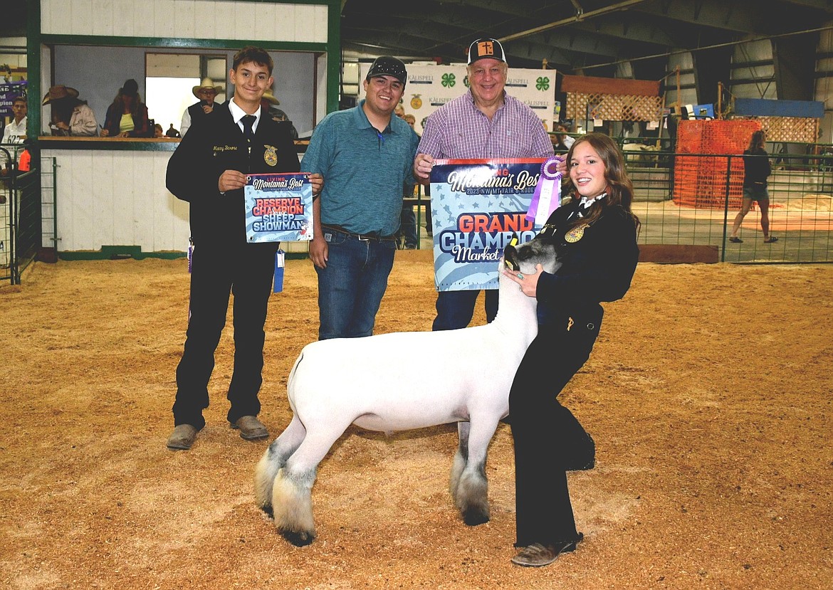 Laila Sargent sold her grand champion sheep to Sargent Transportation at the Flathead Livestock Market Sale Auction at the Northwest Montana Fair. (Photo courtesy of Alicia Gower)