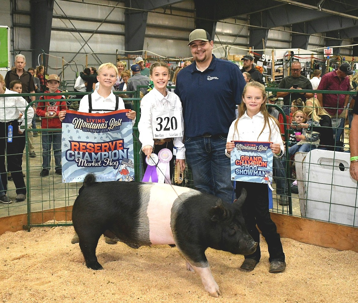 Olivia Druyvestein sold her reserve champion hog to Whitefish Credit Union at the Flathead Livestock Market Sale Auction at the Northwest Montana Fair. (Photo courtesy of Alicia Gower)