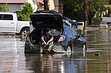 As Tropical Storm Hilary shrinks, desert and mountain towns dig themselves out of the mud