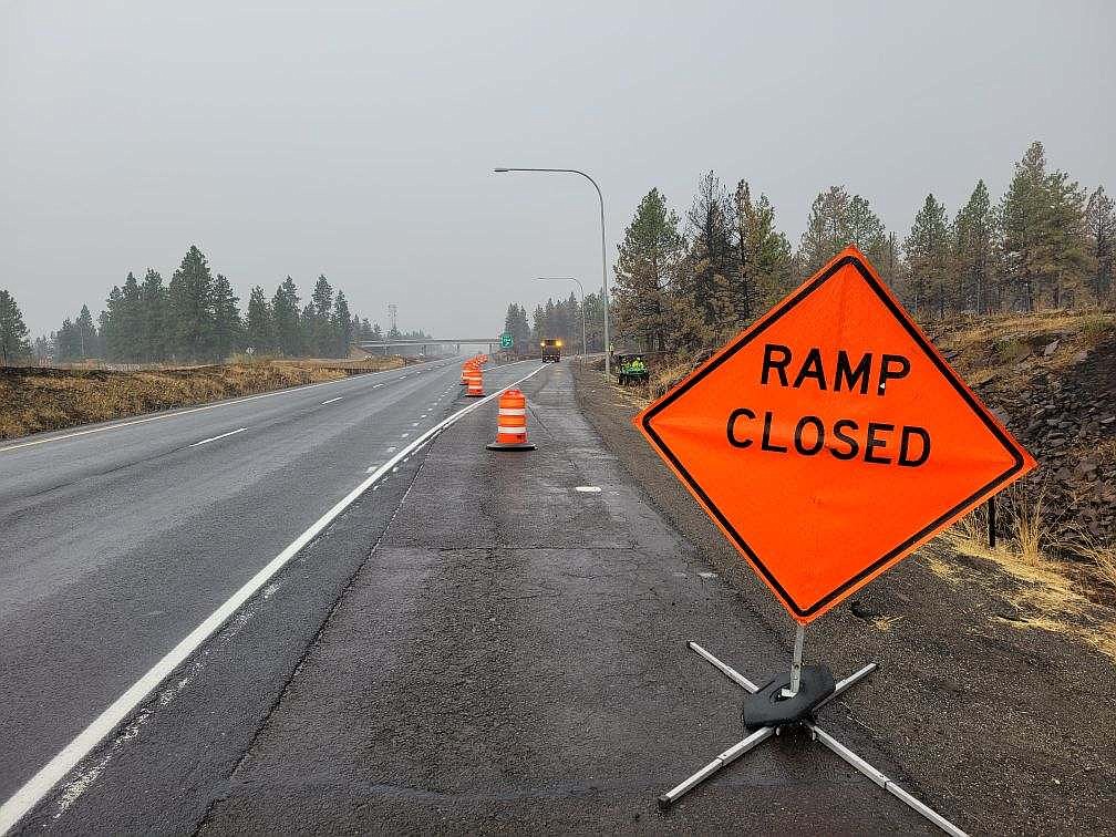 A little rain had fallen Monday night, but the area around the Salnave/SR 902 interchange on Interstate 90 in Spokane County was still an active fire zone, according to the Washington State Department of Transportation. The freeway had reopened Tuesday morning and some residents of the area were allowed to return home, but SR 902 from I-90 to Medical Lake was still closed.