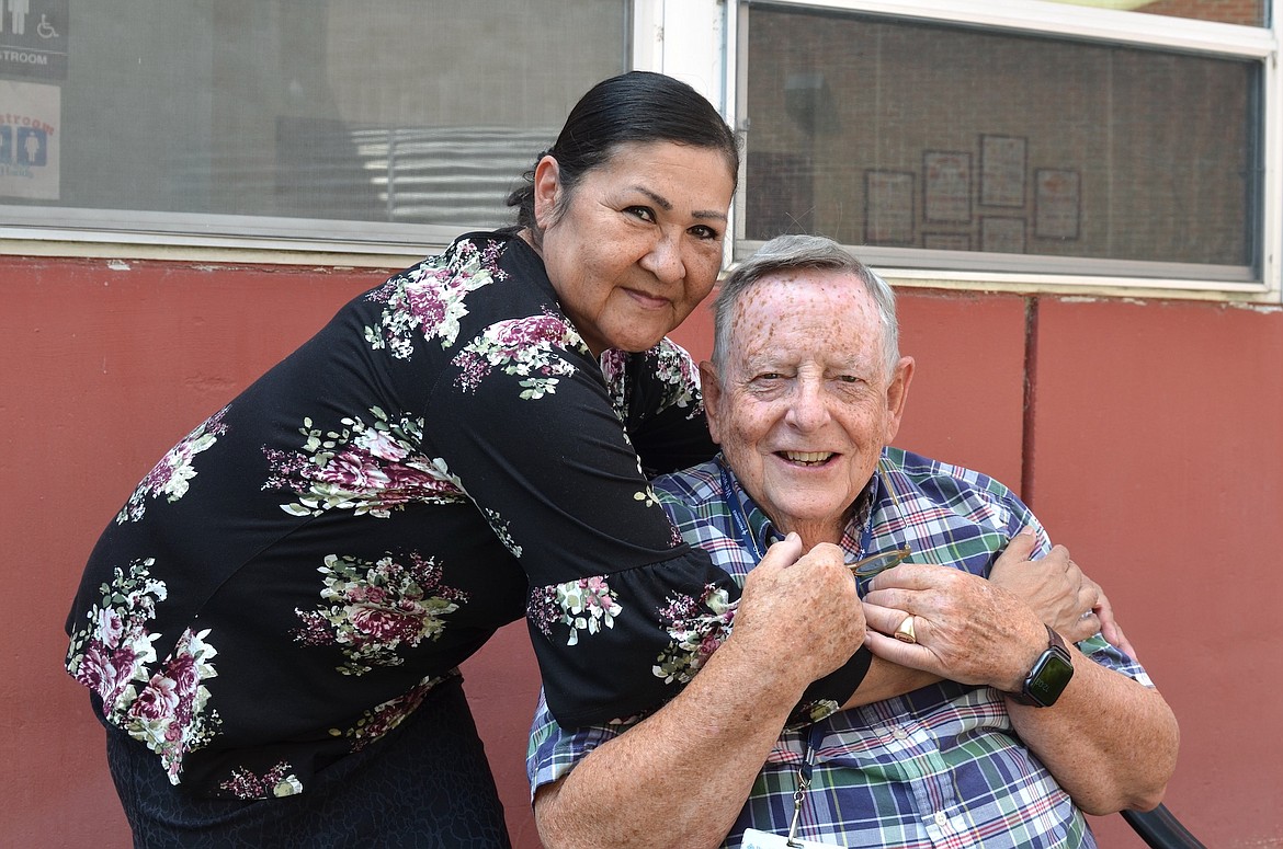 Pastor John Payne says goodbye to St. Joseph Hospital employee Selma Swank. (Kristi Niemeyer/Leader)