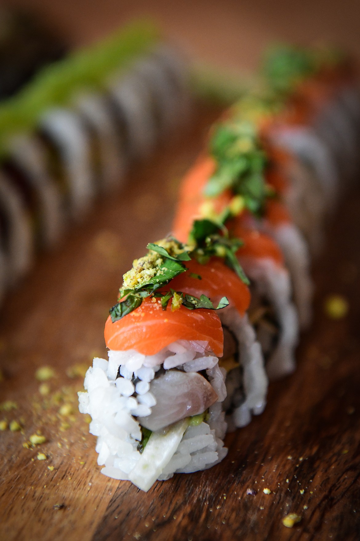 Lil' Chimmy sushi featuring king salmon, black cod, avocado, fennel, cilantro, lime, pistachio, rosé ponzu and 5 spice at Indah Sushi in Whitefish on Wednesday, Aug. 23. (Casey Kreider/Daily Inter Lake)