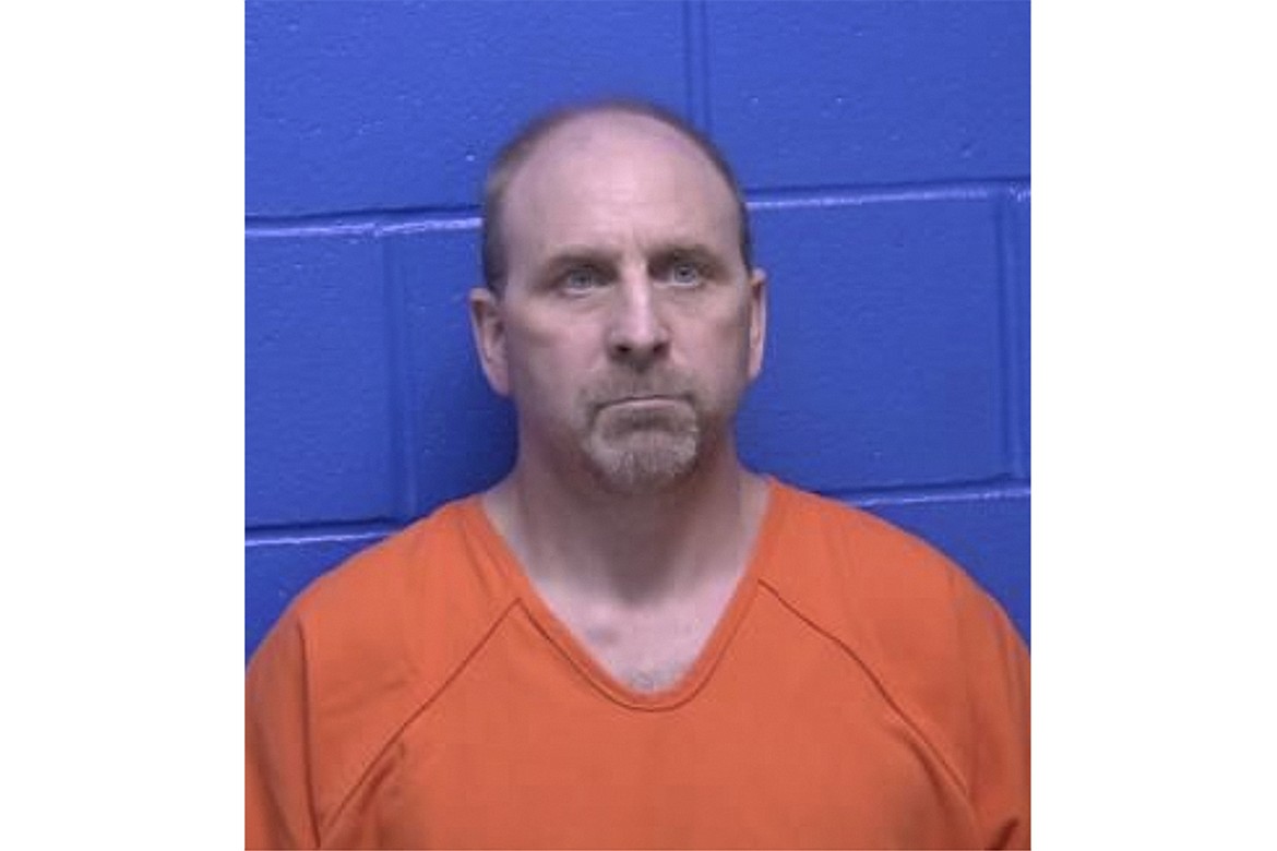 This undated booking photo provided by the Missoula County, Mont., Sheriff's Office shows Kevin Patrick Smith. Smith was sentenced on Thursday, Aug. 24, 2023, to 30 months in federal prison for threatening the life of Democratic U.S. Sen. Jon Tester in voicemails left at the senator's office in Kalispell, Mont., where Smith lives. (Missoula County Sheriff's Office via AP)