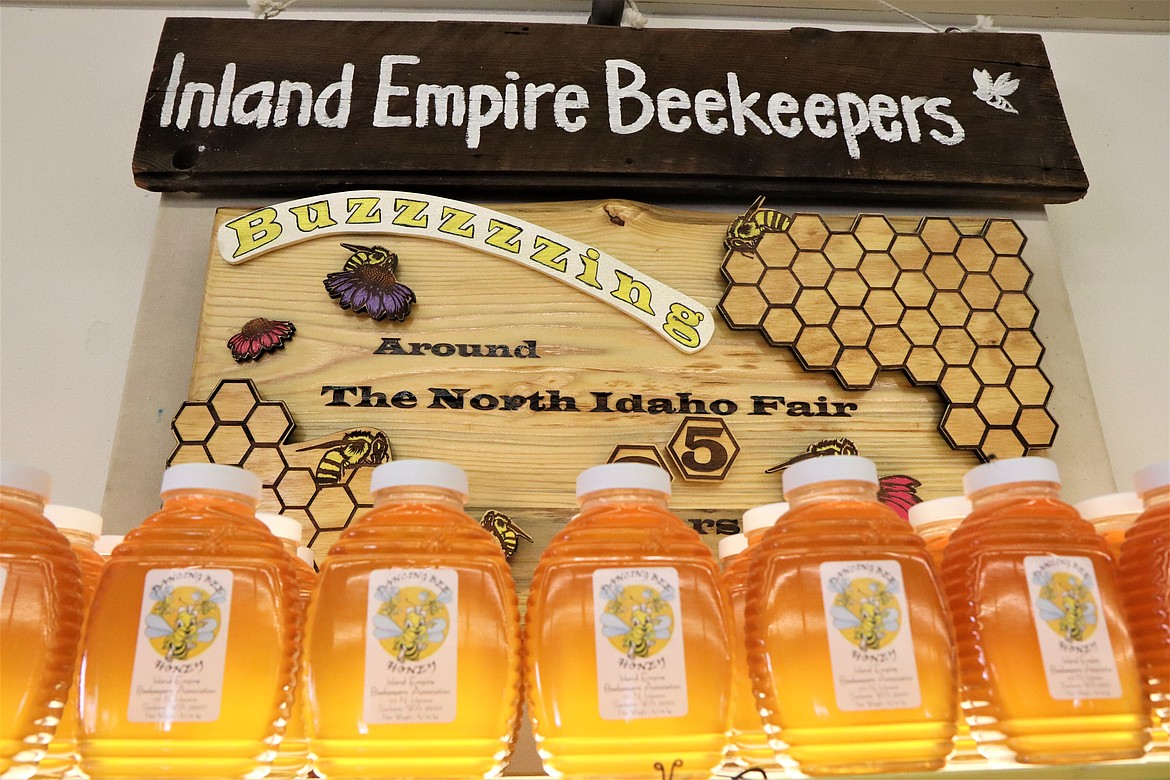 Containers of honey stand for sale at the North Idaho State Fair on Thursday.