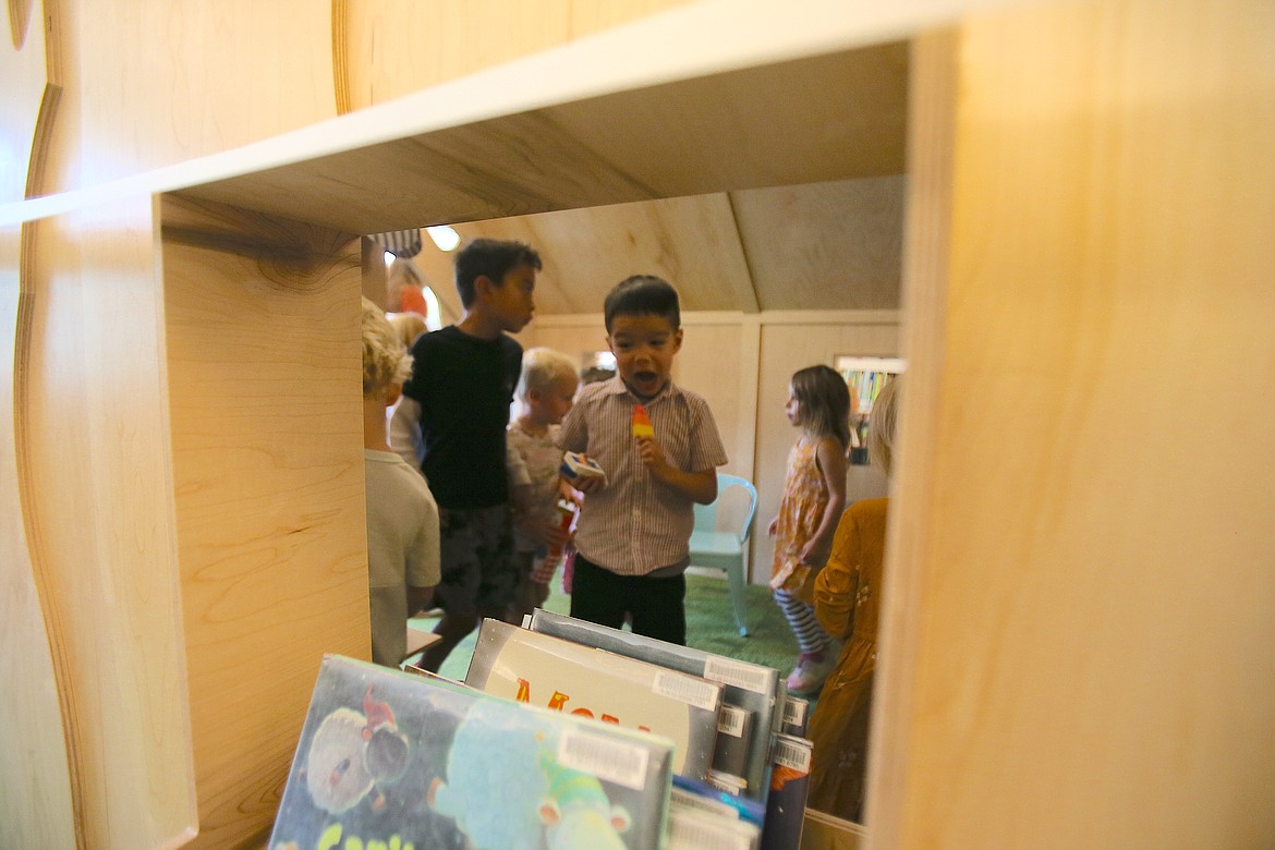 Kids immediately step into a world of imagination in the new story cabin that was unveiled during a fun ceremony Thursday morning at the Coeur d'Alene Public Library.