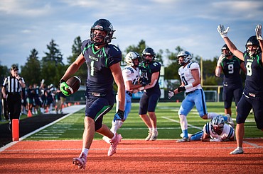 Glacier wide receiver Cohen Kastelitz (1) celebrates after a touchdown reception in the first quarter against Great Falls at Legends Stadium on Friday, Aug. 25. (Casey Kreider/Daily Inter Lake)