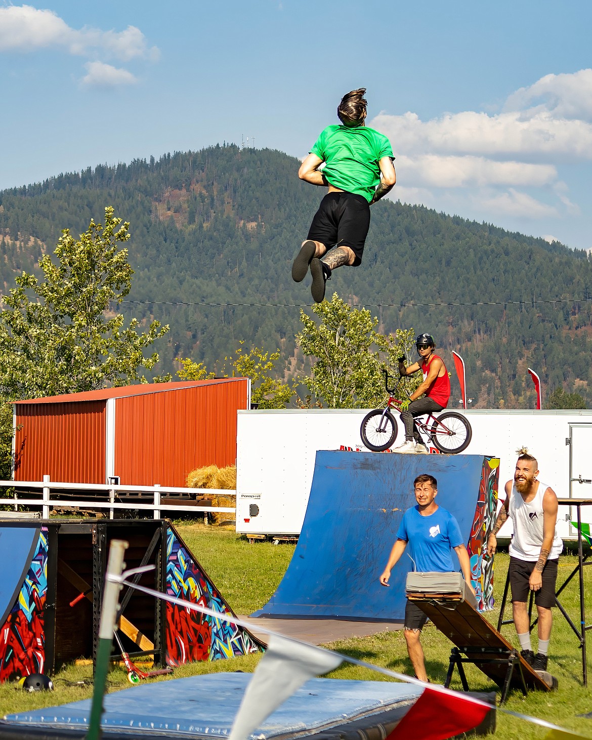 BMX stunts and trampoline achievements during the Off Axis Stunt Show.