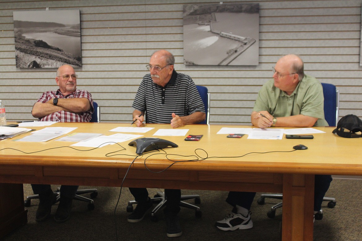 Port of Quincy commissioners from left, Patric Connolly, Curt Morris and Brian Kuest discuss the options for the Bishop Recreation Area Wednesday.