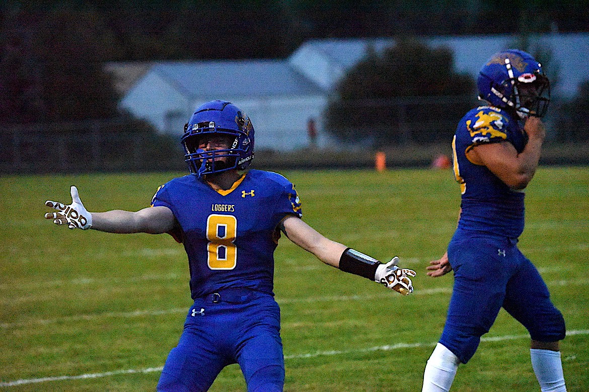 Libby's Ryan Beagle celebrates an interception in the third quarter of Friday's game against Stevensville. (Scott Shindledecker/The Western News)