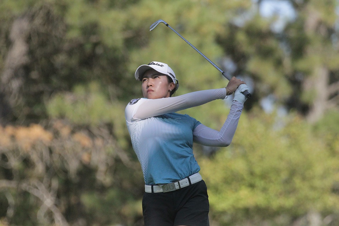 MARK NELKE/Press
Minji Kang of Korea watches her tee shot on the par-3 16th hole Sunday in the final round of the Epson Tour Circling Raven Championship at Circling Raven Golf Club in Worley. Kang finished tied for third.