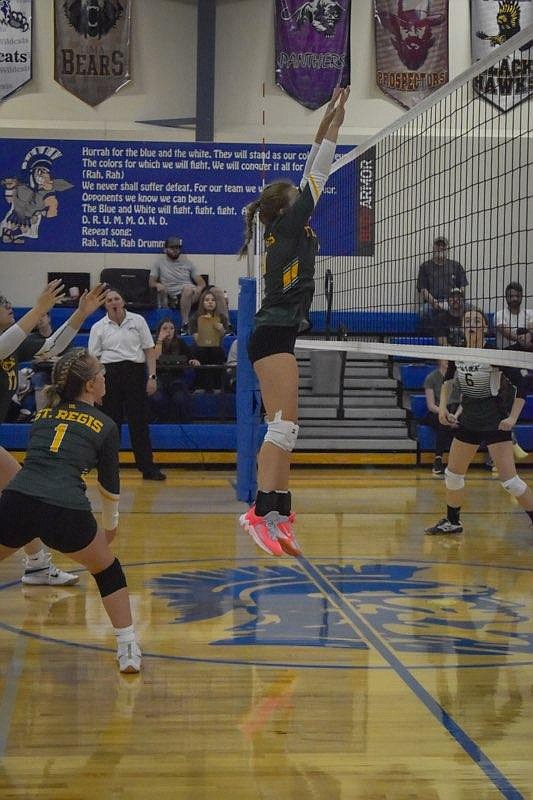 St Regis volleyball's front line fought hard against Seeley Friday night in a down-to-the-wire five set match won by the Lady Blackhawks 3-2.  (Photo by Ryle Burnham)