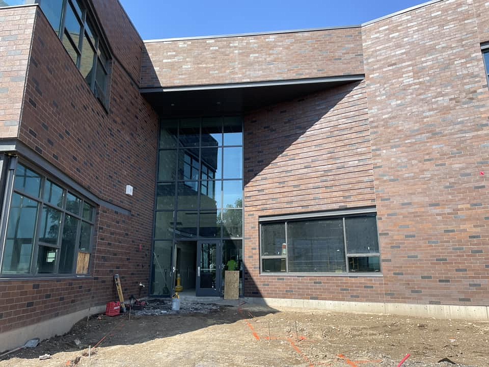 The front entrance of the new Almira school under construction in July. A ribbon cutting is scheduled for Thursday.