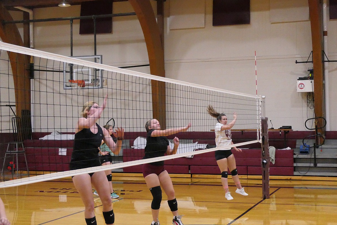 Members of this year's Alberton High volleyball team do at the net drills during a recent preseason practice. (Chuck Bandel/MI-VP)