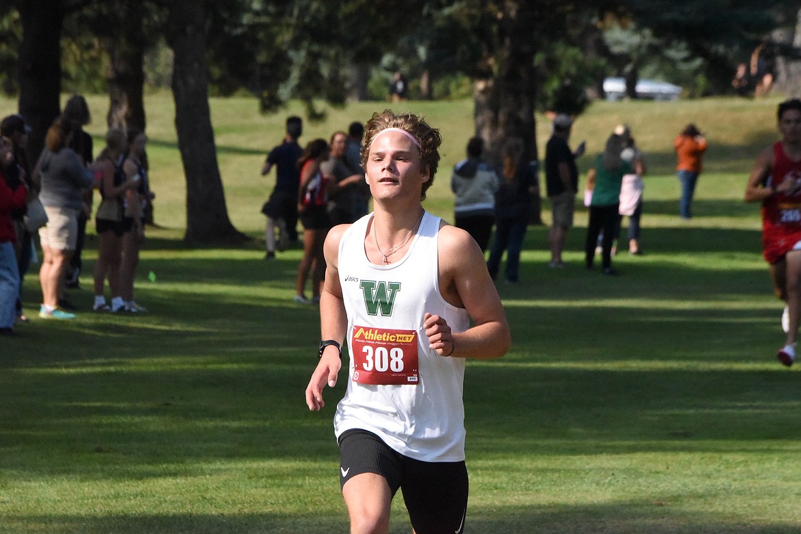 Whitefish’s Mason Genovese runs in the Libby cross-country meet on Friday. (Scott Shindledecker/The Western News)