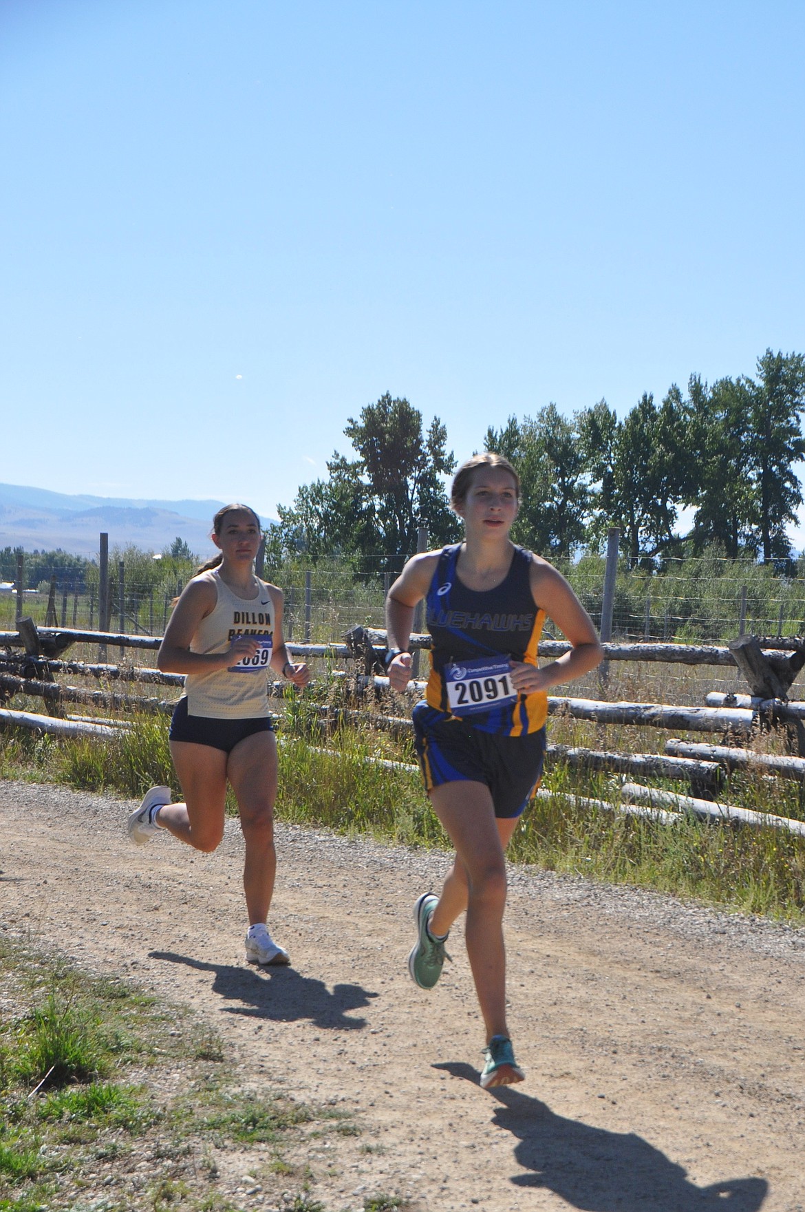 Thompson Falls freshman Aubrey Baxter powers through the Grant-Kohrs course in Deer Lodge this weekend on her way to a fourth place finish and a second place team showing this past Saturday. (Photo by Rylie Burnham)