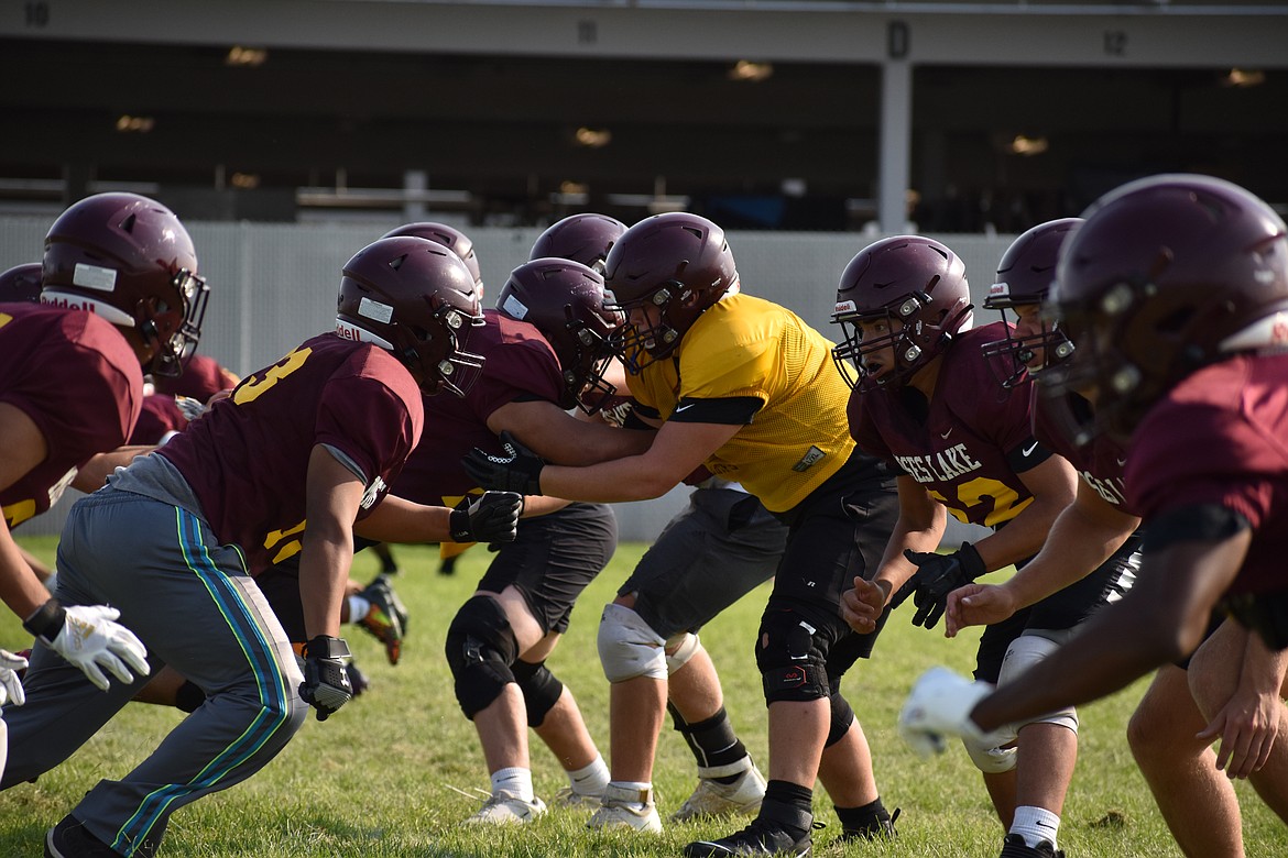 The Maverick offensive and defensive lines crash toward each other during a Moses Lake practice on Aug. 23.