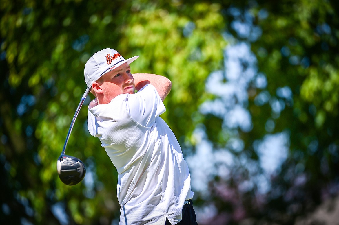 Flathead's Tyler Williams watches his drive on the first tee at Village Greens Golf Course on Tuesday, Aug. 29. (Casey Kreider/Daily Inter Lake)
