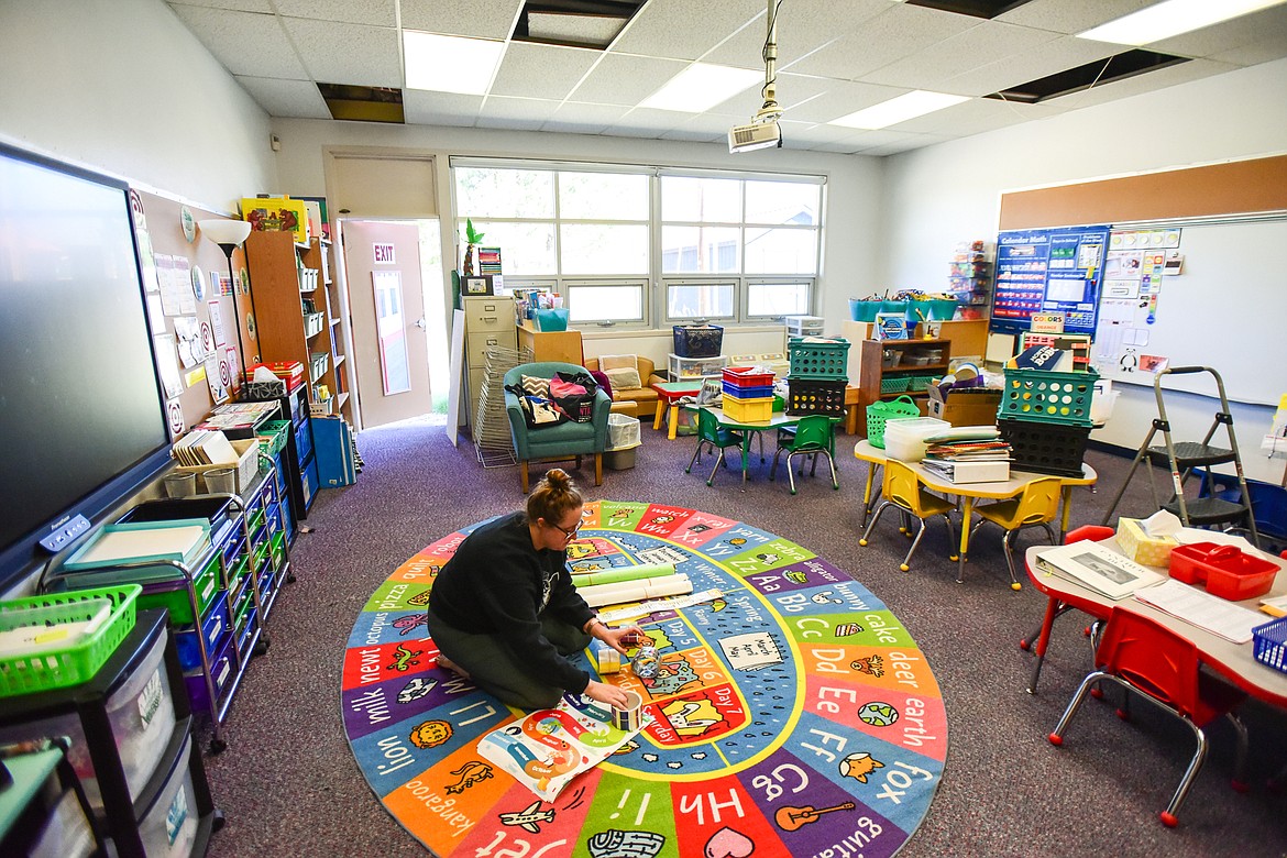 Kindergarten teacher Michele Hagen readies her classroom for the upcoming year at Marion School on Tuesday, Aug. 29. (Casey Kreider/Daily Inter Lake)