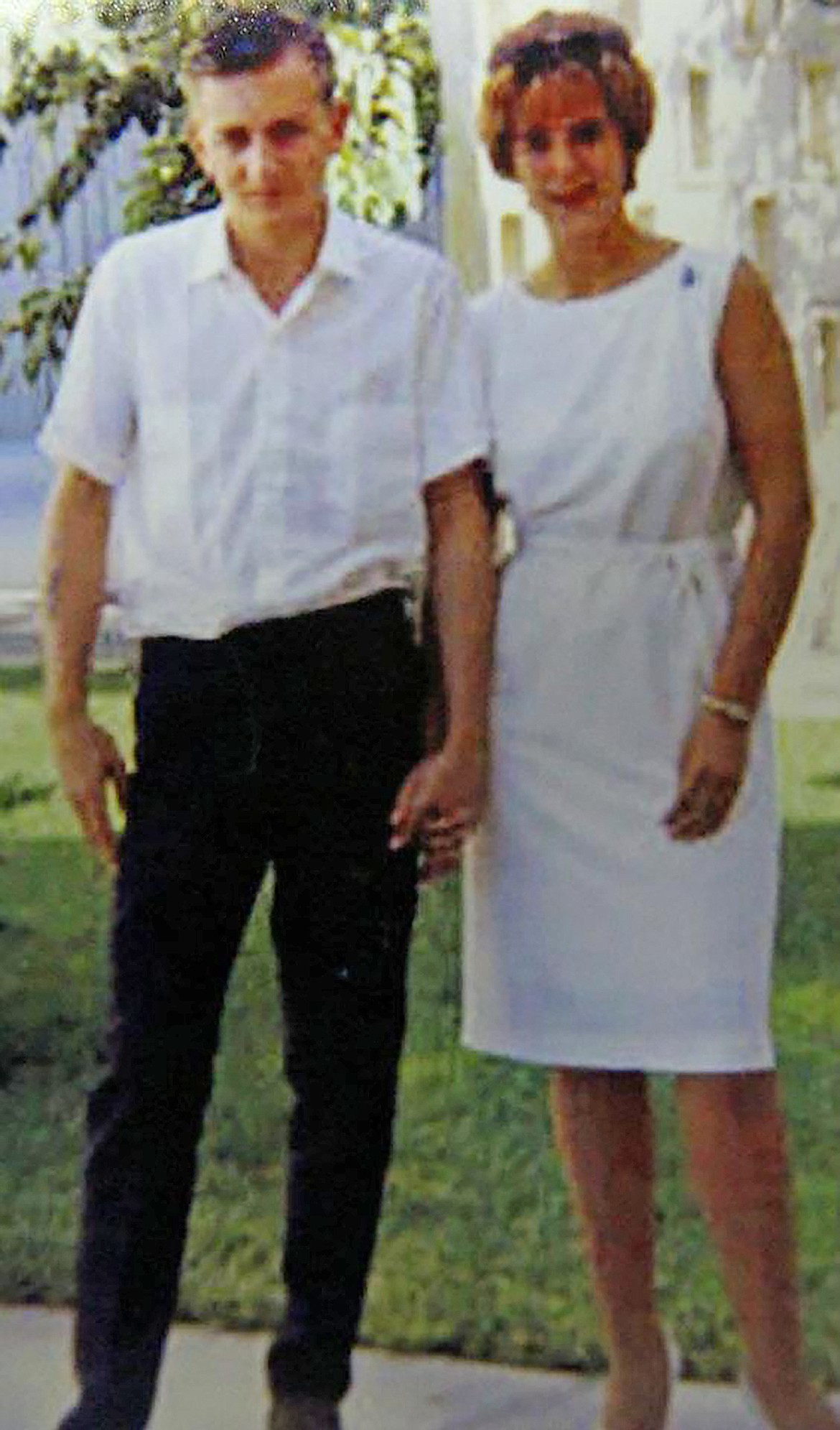 Ralph and Beverly Goding are pictured on their wedding day on July 31, 1963.