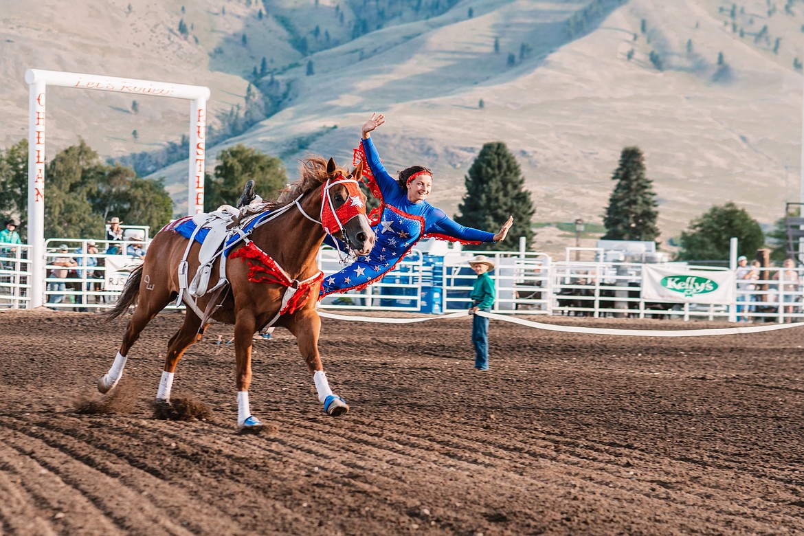 Fourteen-year-old Paige Sullivan, one of the Aces Wild Trick Riders, performs a maneuver called a full stroud layout. The Aces Wild Trick Riders will perform at the Ritzville Rodeo this weekend.