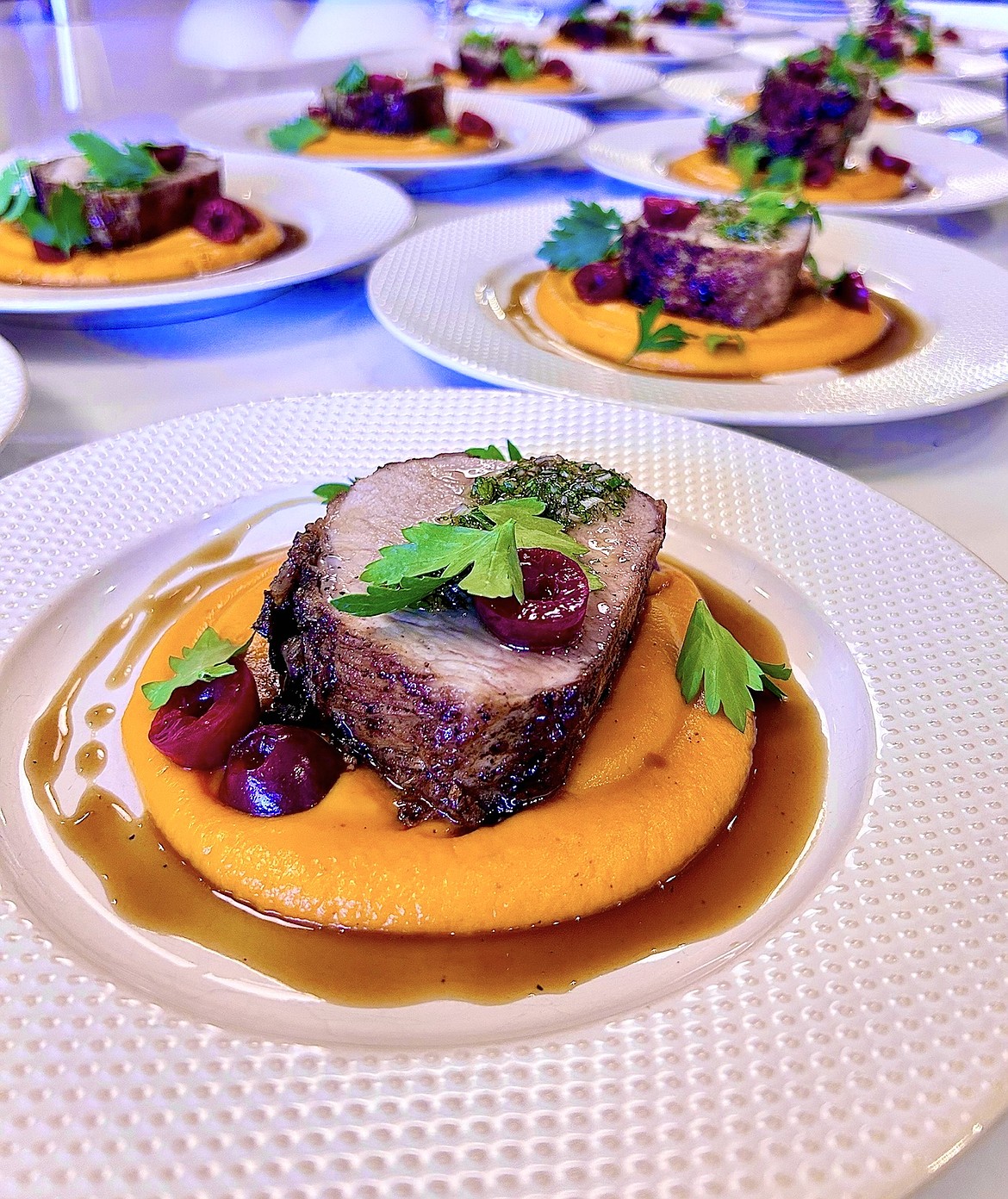 Swift Creek Cafe’s roasted pork tenderloin with sweet potato purée, along with pickled Flathead cherries, pork and lovage demi. (Courtesy photo)