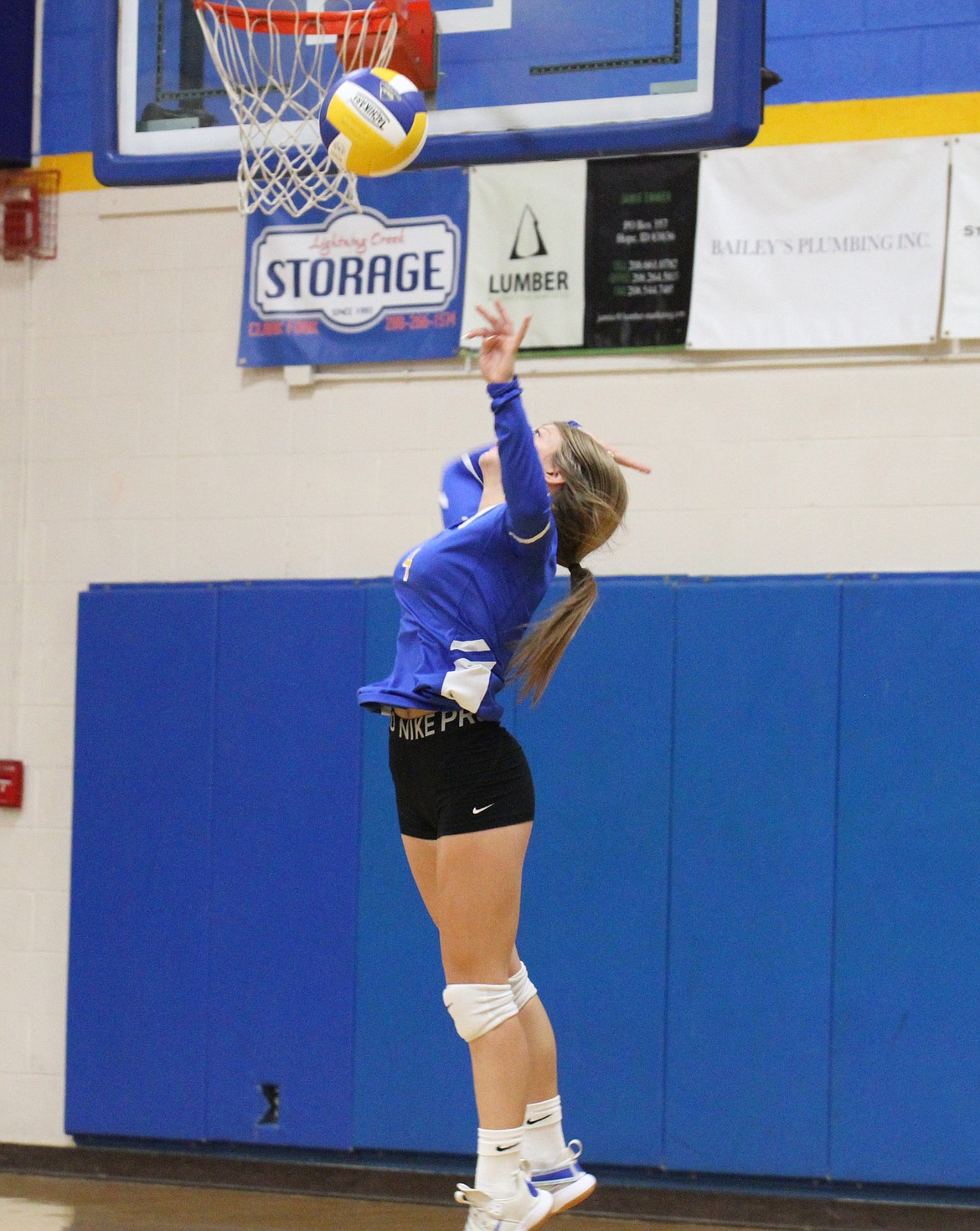 Clark Fork's Eloise Shelton flies high during a jump serve against the Badgers on Wednesday.