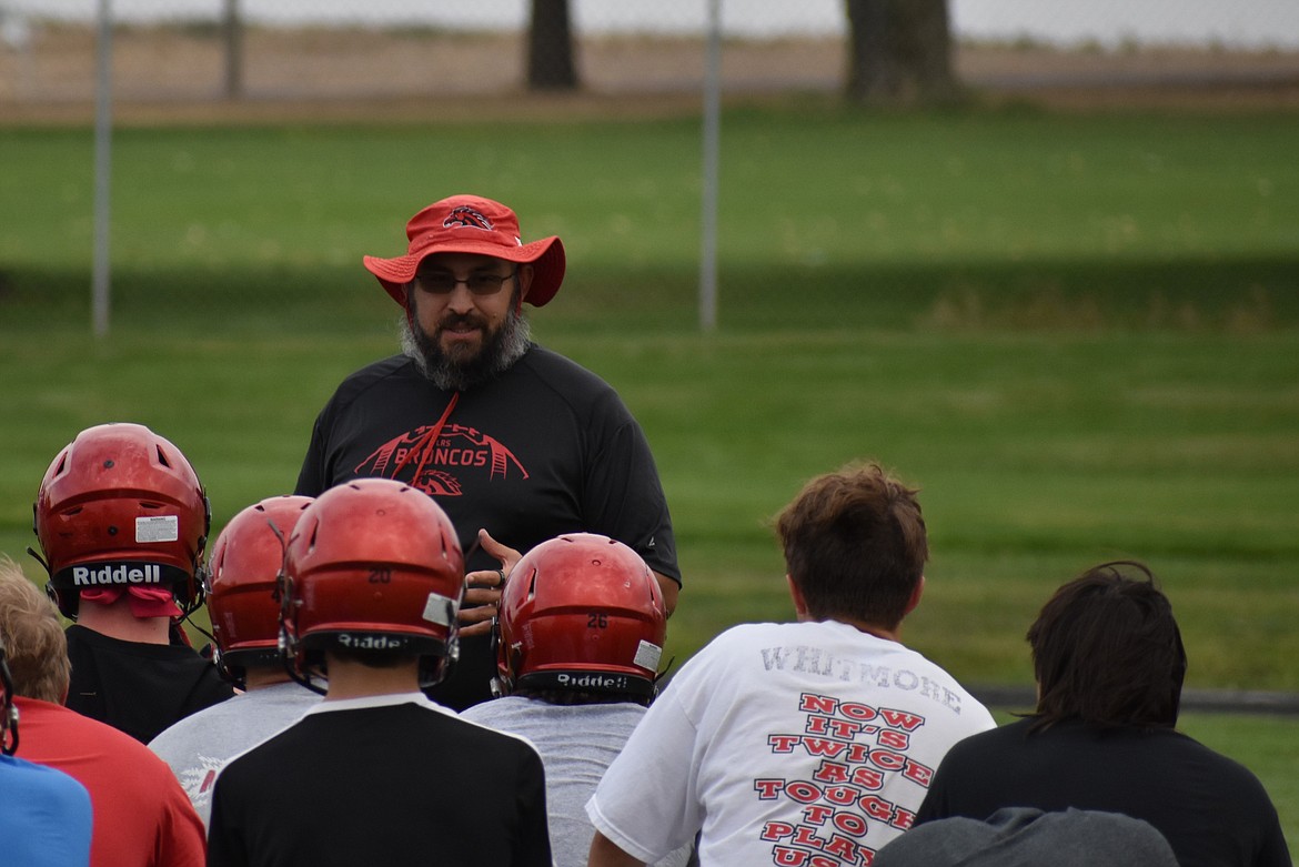 Lind-Ritzville/Sprague Head Coach Brendan Bermea talks with players before an Aug. 17 practice in Ritzville.