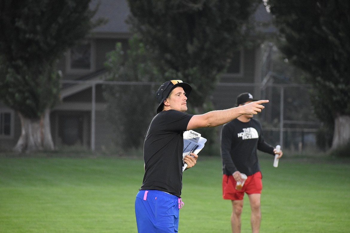 Warden Head Coach Dallyn McLean calls out a play during practice on Aug. 24. McLean was raised in South Africa native and played rugby before transitioning to football.